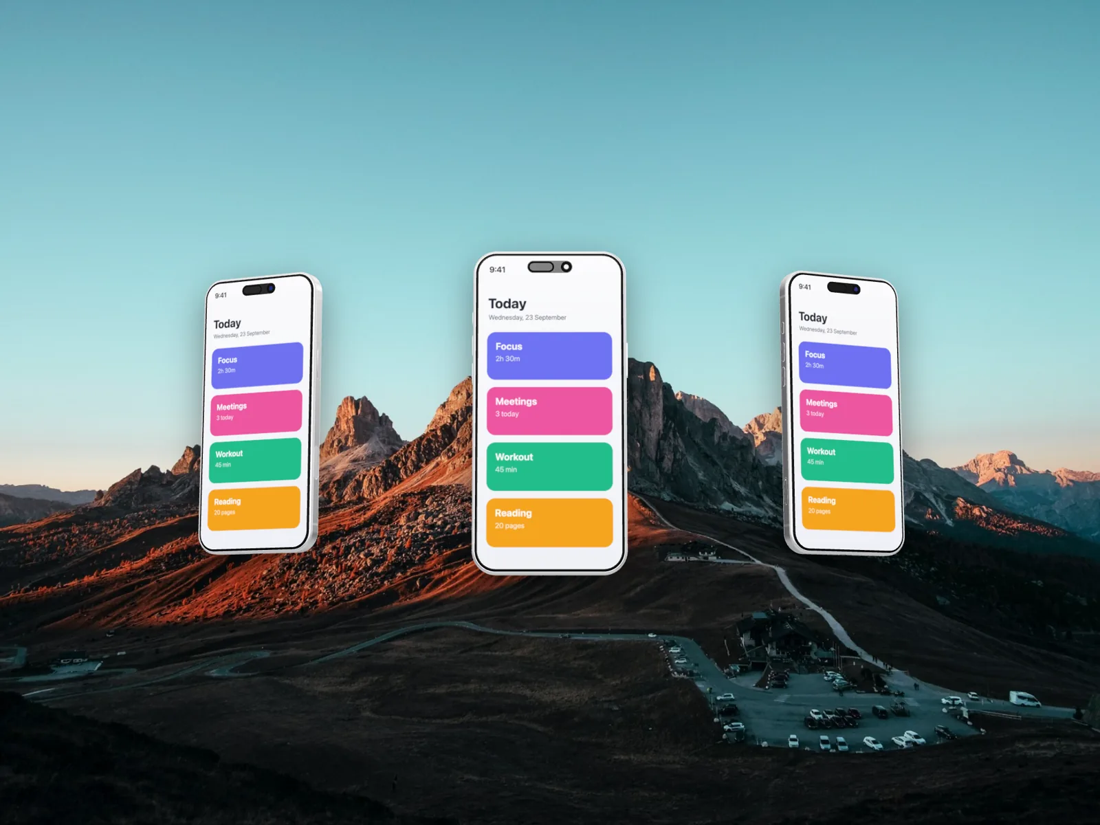Three iPhones in 3D, arranged in an arc over mountains