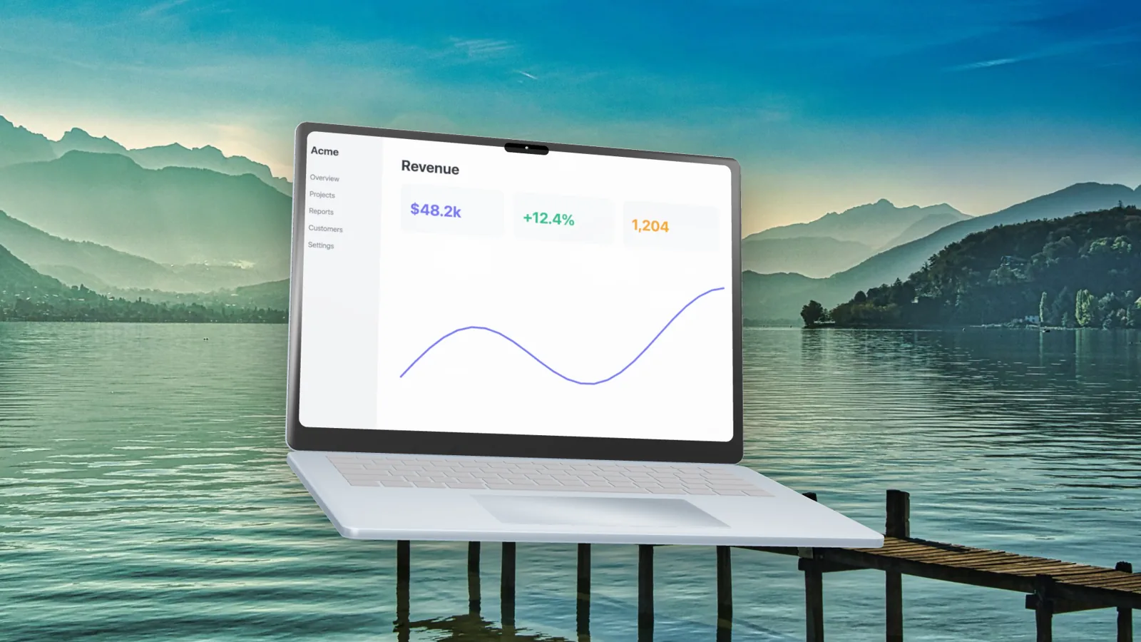A MacBook Air mockup in front of a mountain lake